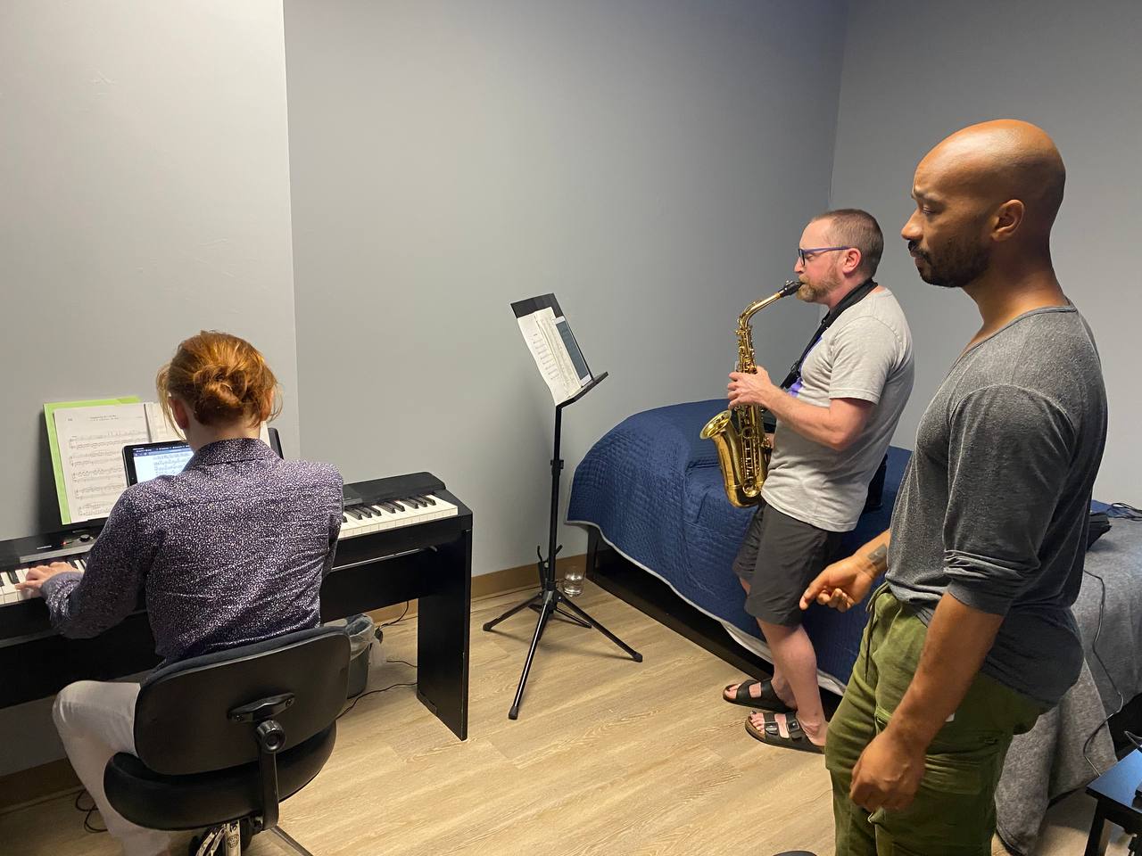 Folks jamming in the music room