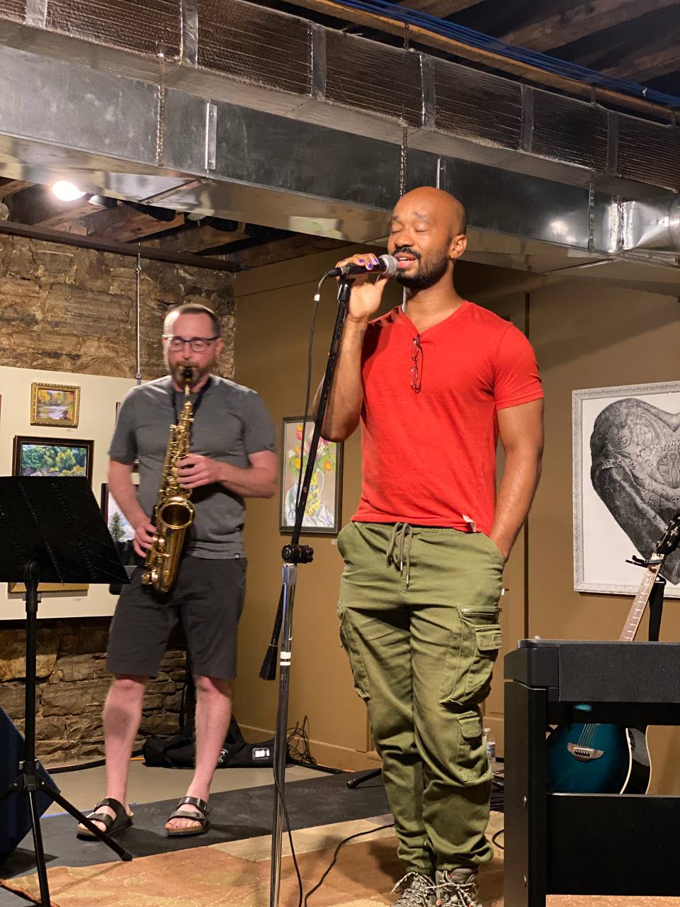 Dain sings at Malone open mic