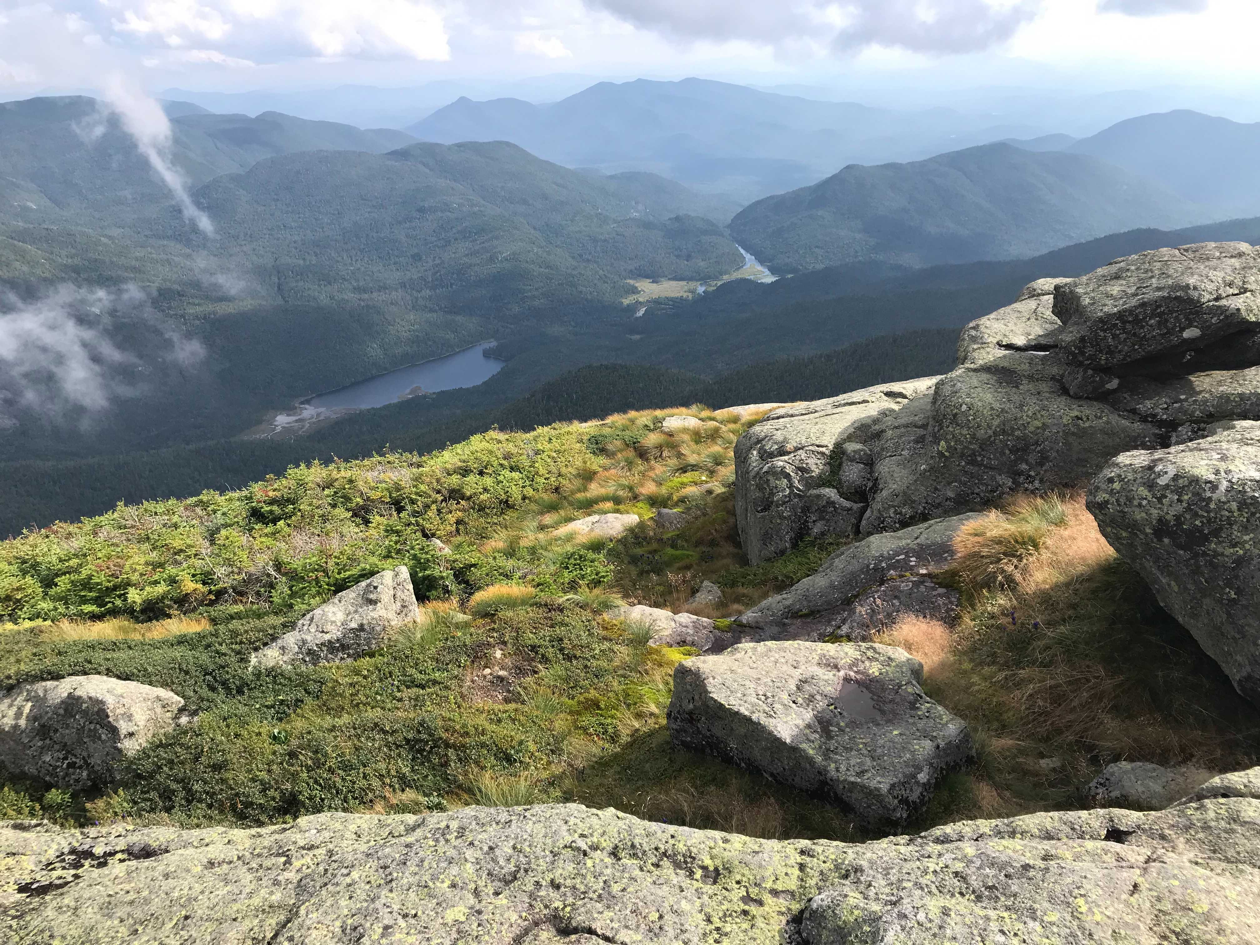 Scenic view of mountains and lakes from a hiking trail