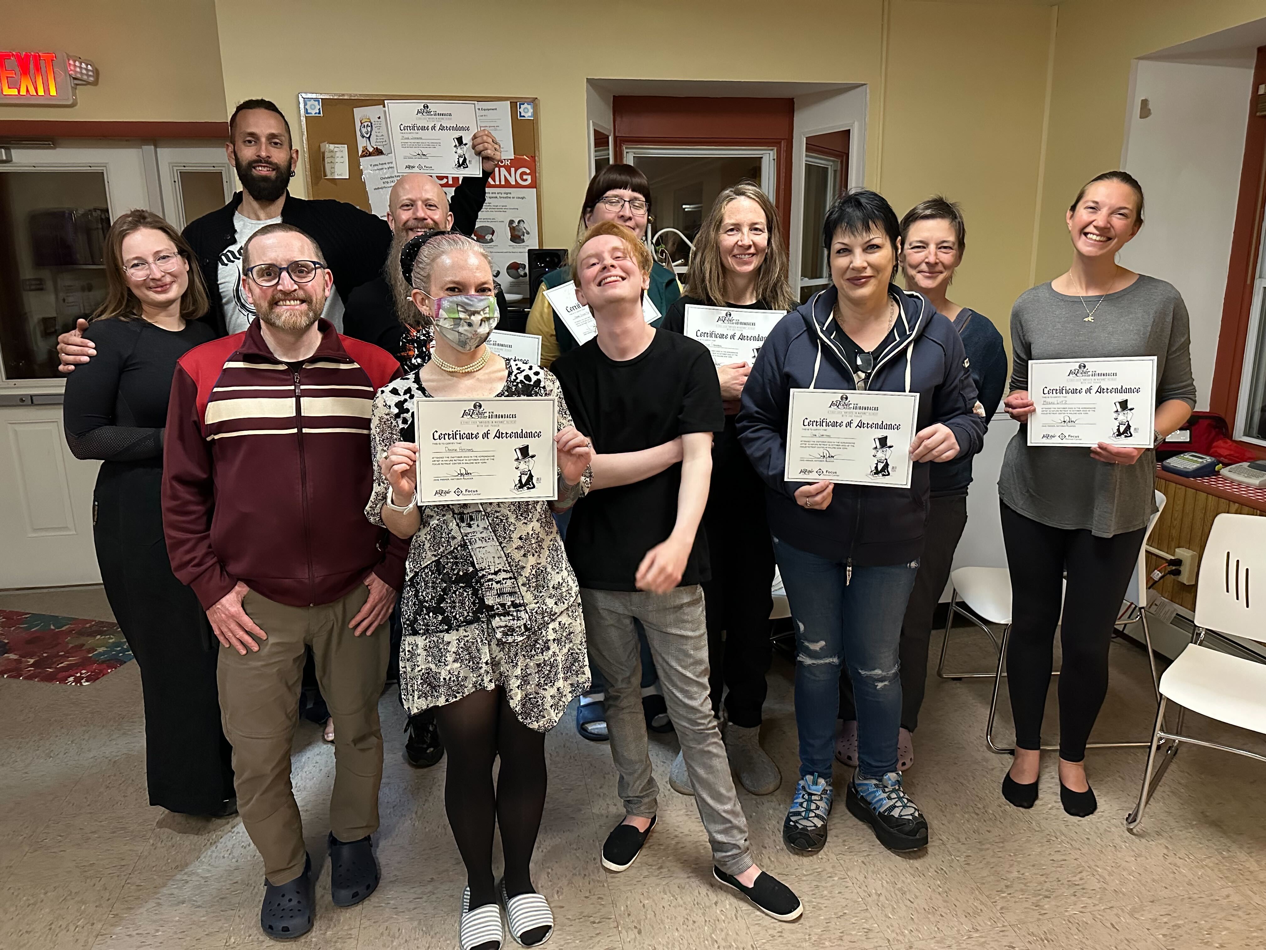 Guests celebrating completing the Inktober illustration challenge